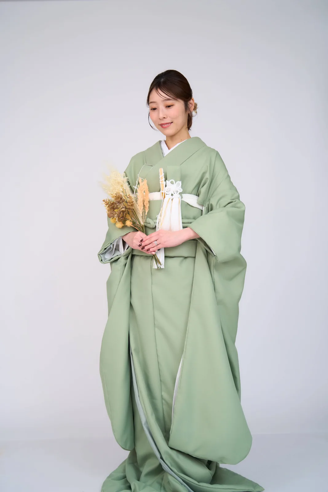 緑の色掛下を着た花嫁の撮影事例