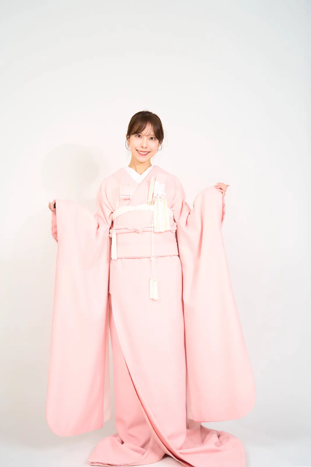 ピンクの色掛下を着た花嫁の撮影事例